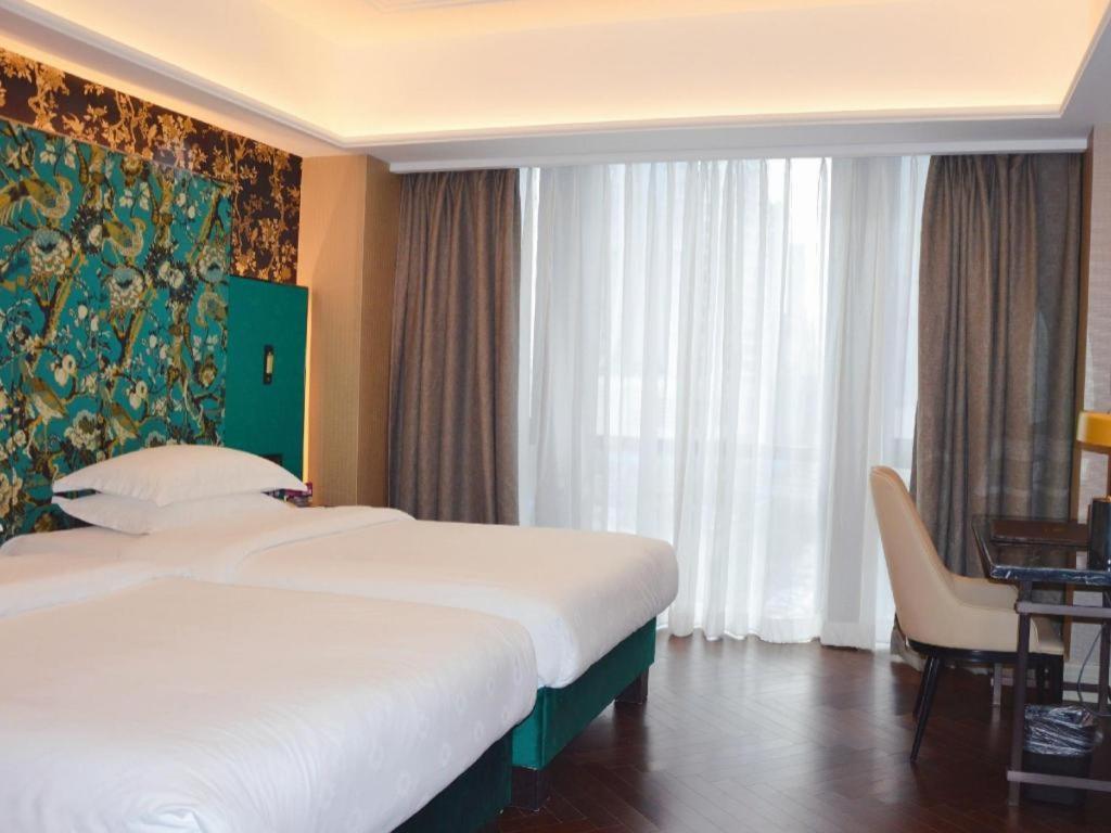 Metropolo Hotel Financial Street Wanda Plaza Фучжоу Экстерьер фото